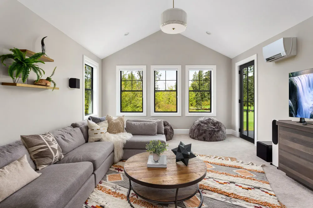 What Is a Mini-Split? room indoors family sofa contemporary house home window apartment seat coffee table minimalist luxury fireplace cushion