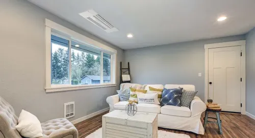 Give Your Family Personalized Comfort Year Round with Heat Pump Technology room indoors sofa contemporary family window seat house apartment home chair luxury table cushion coffee table